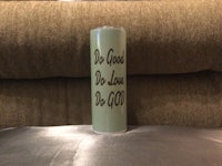 a toilet paper holder with the words do good do good